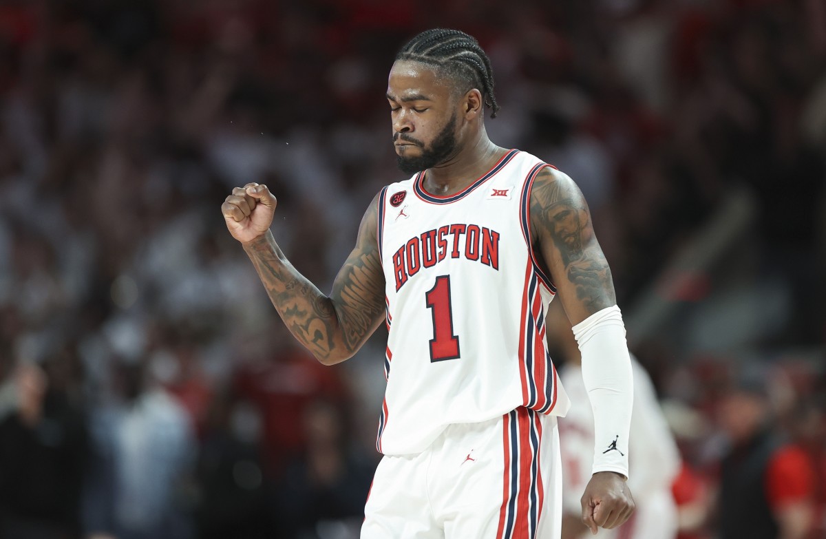 Mar 9, 2024; Houston, Texas, USA; Houston Cougars guard Jamal Shead (1) reacts after a play during the first half against the Kansas Jayhawks at Fertitta Center. 